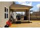 Back porch featuring a wooden deck, grill, and dining table at 1657 10Th St, Danville, IN 46122