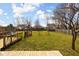 Backyard featuring a swing set, play area, and grass lawn at 1657 10Th St, Danville, IN 46122