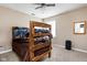 Comfortable bedroom with a bunk bed, ceiling fan, and plenty of space for relaxation at 1657 10Th St, Danville, IN 46122