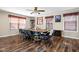 Spacious dining room with hardwood floors, large wooden table, and ample natural light, perfect for gatherings at 1657 10Th St, Danville, IN 46122