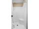 Clean and functional shower stall with a built-in seat and simple design at 1657 10Th St, Danville, IN 46122