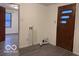 Utility area features a modern floor, waiting for laundry machines to be installed at 1900 E Purdue Rd, Muncie, IN 47303