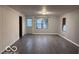 Cozy living room with durable flooring, perfect for relaxation and gatherings at 1900 E Purdue Rd, Muncie, IN 47303