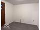 Spacious room with smooth flooring, providing a blank canvas for your design ideas at 1900 E Purdue Rd, Muncie, IN 47303