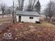 Exterior view of a weathered single-story shed with a door and window at 1900 E Purdue Rd, Muncie, IN 47303