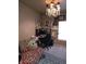 Bright office space featuring built-in shelving, desk area, and contemporary chandelier at 2121 Grenville St # Apt 2A, Carmel, IN 46032