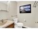 Cozy bathroom with a sink, toilet, vanity, and framed image at 2184 Galaxy Dr, Franklin, IN 46131