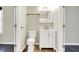 This bathroom has a vanity and toilet with white fixtures at 2184 Galaxy Dr, Franklin, IN 46131