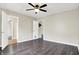 This bedroom features dark wood floors and multiple closets at 2184 Galaxy Dr, Franklin, IN 46131