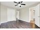 This bedroom features dark wood floors and a large closet at 2184 Galaxy Dr, Franklin, IN 46131