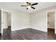 This bedroom features dark wood floors and a ceiling fan at 2184 Galaxy Dr, Franklin, IN 46131