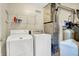 Well-equipped laundry room with modern washer, dryer, and water heater at 2184 Galaxy Dr, Franklin, IN 46131
