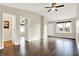 Bright, spacious living room featuring hardwood floors, a ceiling fan, and plenty of natural light at 2184 Galaxy Dr, Franklin, IN 46131
