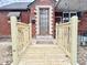 Close-up view of the home's front door and newly constructed ramp at 24 N Clay St, Mooresville, IN 46158