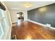 Spacious living room featuring hardwood floors and a neutral color palette at 24 N Clay St, Mooresville, IN 46158