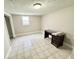 Flexible room with tiled floors, neutral walls, and a desk, perfect for an office at 24 N Clay St, Mooresville, IN 46158