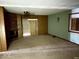 Living room featuring brick fireplace and sliding glass door at 2513 W 10Th St, Muncie, IN 47302