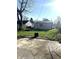Backyard featuring a concrete patio and sparse grass at 2526 Eastern Ave, Indianapolis, IN 46218