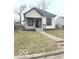 Quaint single-story house with a covered porch, awaiting your personal touches at 2526 Eastern Ave, Indianapolis, IN 46218