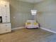 Open dining room with wood floors, chandelier and cabinetry at 2528 Carrollton Ave, Indianapolis, IN 46205