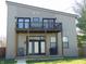Modern home with a balcony, offering outdoor relaxation and entertainment at 2528 Carrollton Ave, Indianapolis, IN 46205