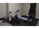 A home gym setup with two exercise bikes and workout equipment at 2528 Carrollton Ave, Indianapolis, IN 46205