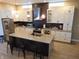 Beautiful kitchen featuring stainless steel appliances, island with seating, and modern finishes at 2528 Carrollton Ave, Indianapolis, IN 46205