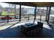 Inviting porch with comfortable seating, perfect for relaxing and enjoying the outdoors at 2528 Carrollton Ave, Indianapolis, IN 46205