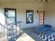 A porch area featuring ample seating and stylish decor, perfect for relaxing at 2528 Carrollton Ave, Indianapolis, IN 46205