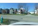 Neighborhood street featuring well-kept homes and mature trees, providing a serene atmosphere at 2528 Carrollton Ave, Indianapolis, IN 46205