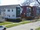 Street view of several two-story homes with various designs and colors, enhancing neighborhood charm at 2528 Carrollton Ave, Indianapolis, IN 46205
