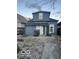 View of backyard with walkway, fence, and access to back entrance of house at 2842 Indianapolis Ave, Indianapolis, IN 46208