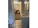 This bathroom includes a vanity with a sink and tiled flooring at 2842 Indianapolis Ave, Indianapolis, IN 46208