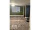 Bedroom features a window, carpet, and an AC unit at 2842 Indianapolis Ave, Indianapolis, IN 46208