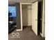 Bedroom featuring carpeting, closet, and window at 2842 Indianapolis Ave, Indianapolis, IN 46208