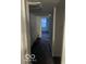 Hallway with carpet and a glimpse of another room at 2842 Indianapolis Ave, Indianapolis, IN 46208
