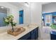 Charming bathroom features a vanity with sink, framed mirror, and decorative elements at 3322 Paisley Pointe, Whitestown, IN 46075