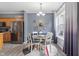 Cozy dining area next to kitchen featuring stylish furniture and a large window with natural light at 3322 Paisley Pointe, Whitestown, IN 46075