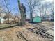 Open backyard with a weathered shed, offering space for outdoor activities and showcasing the property's potential at 3455 Hillside Ave, Indianapolis, IN 46218