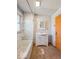 Bathroom features bathtub, sink, and vanity at 3455 Hillside Ave, Indianapolis, IN 46218