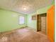 Comfortable bedroom featuring a window and closet at 3455 Hillside Ave, Indianapolis, IN 46218
