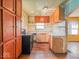 View of the kitchen with a stove, cabinets, and marble countertops at 3455 Hillside Ave, Indianapolis, IN 46218
