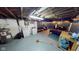 This unfinished basement includes laundry machines, a workbench, and a finished area at 36 Bankers Ln, Indianapolis, IN 46201