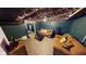 The finished basement features two sofas, a coffee table, and overhead string lighting at 36 Bankers Ln, Indianapolis, IN 46201