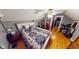 Bedroom with hardwood floors, sloped ceilings, and a queen size bed at 36 Bankers Ln, Indianapolis, IN 46201