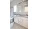 Bright bathroom with double vanity, granite countertop, and modern fixtures at 3604 Maple Ridge Dr, Columbus, IN 47201