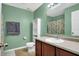 Well-maintained bathroom featuring a vanity, mirror, and a shower with curtain at 3844 Kilburn Ct, Indianapolis, IN 46228