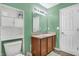 Well-lit bathroom with a vanity, toilet, and built-in shelves for storage at 3844 Kilburn Ct, Indianapolis, IN 46228