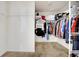 Spacious walk-in closet with ample shelving and clothing racks for organized storage at 3844 Kilburn Ct, Indianapolis, IN 46228