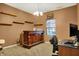 Comfortable room with a large bar area, and a desk space at 3844 Kilburn Ct, Indianapolis, IN 46228